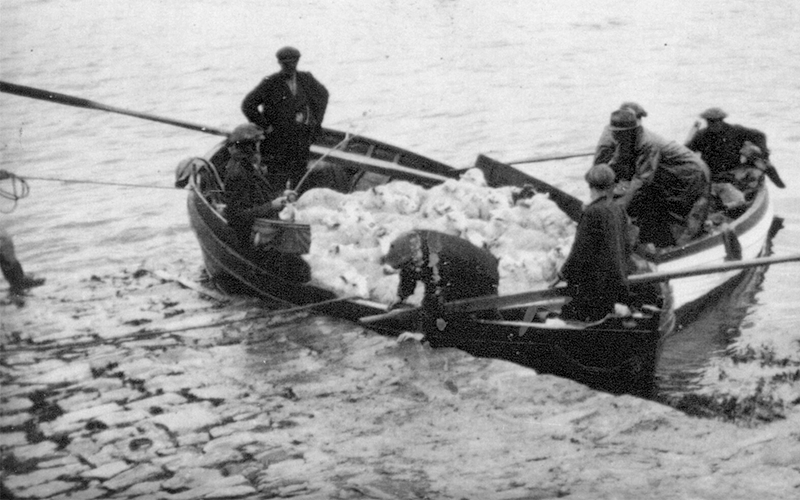 Archieve photo of people on a boat